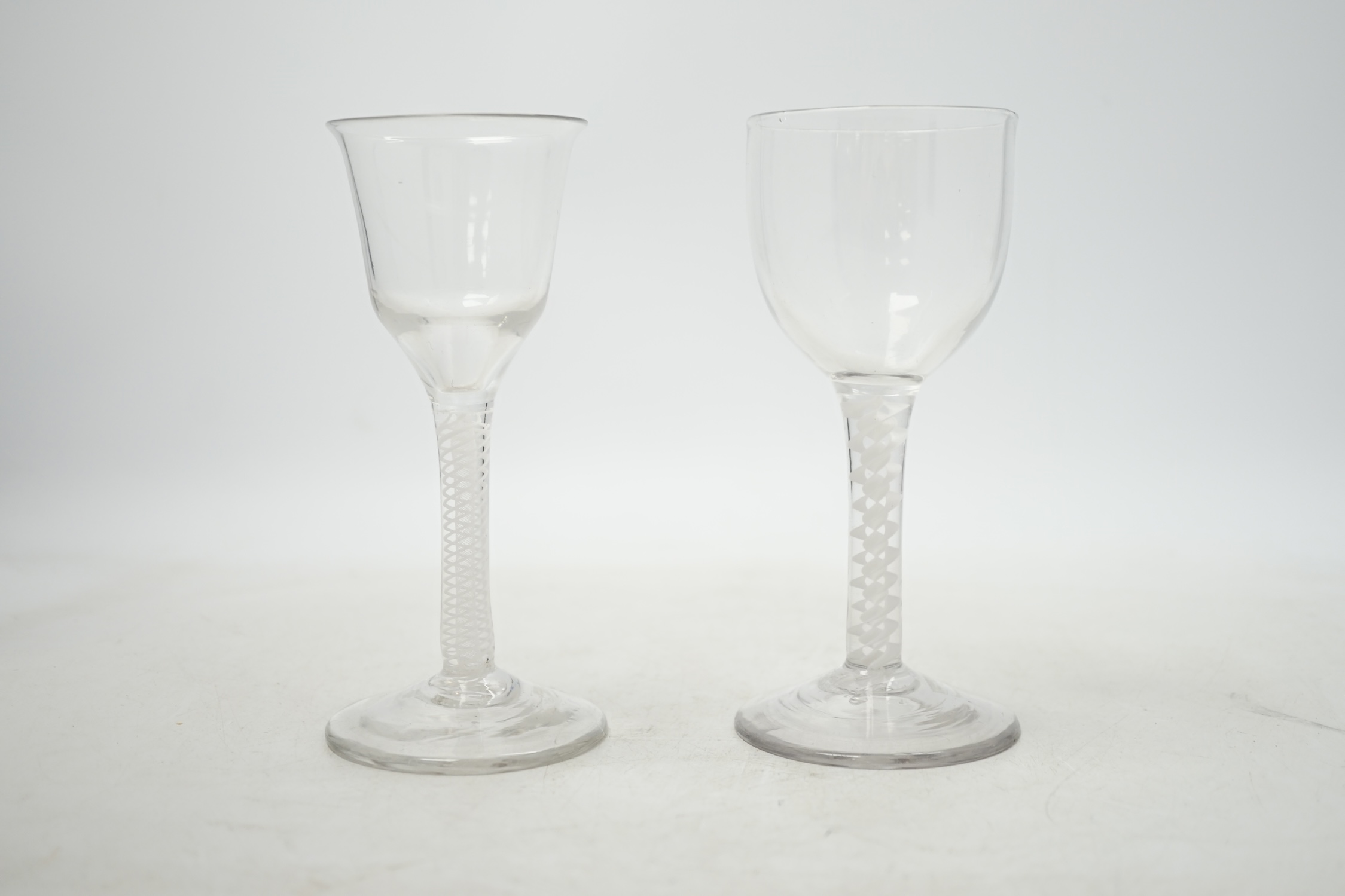 Two mid-18th century opaque twist cordial glasses, 15cm. Condition - good
